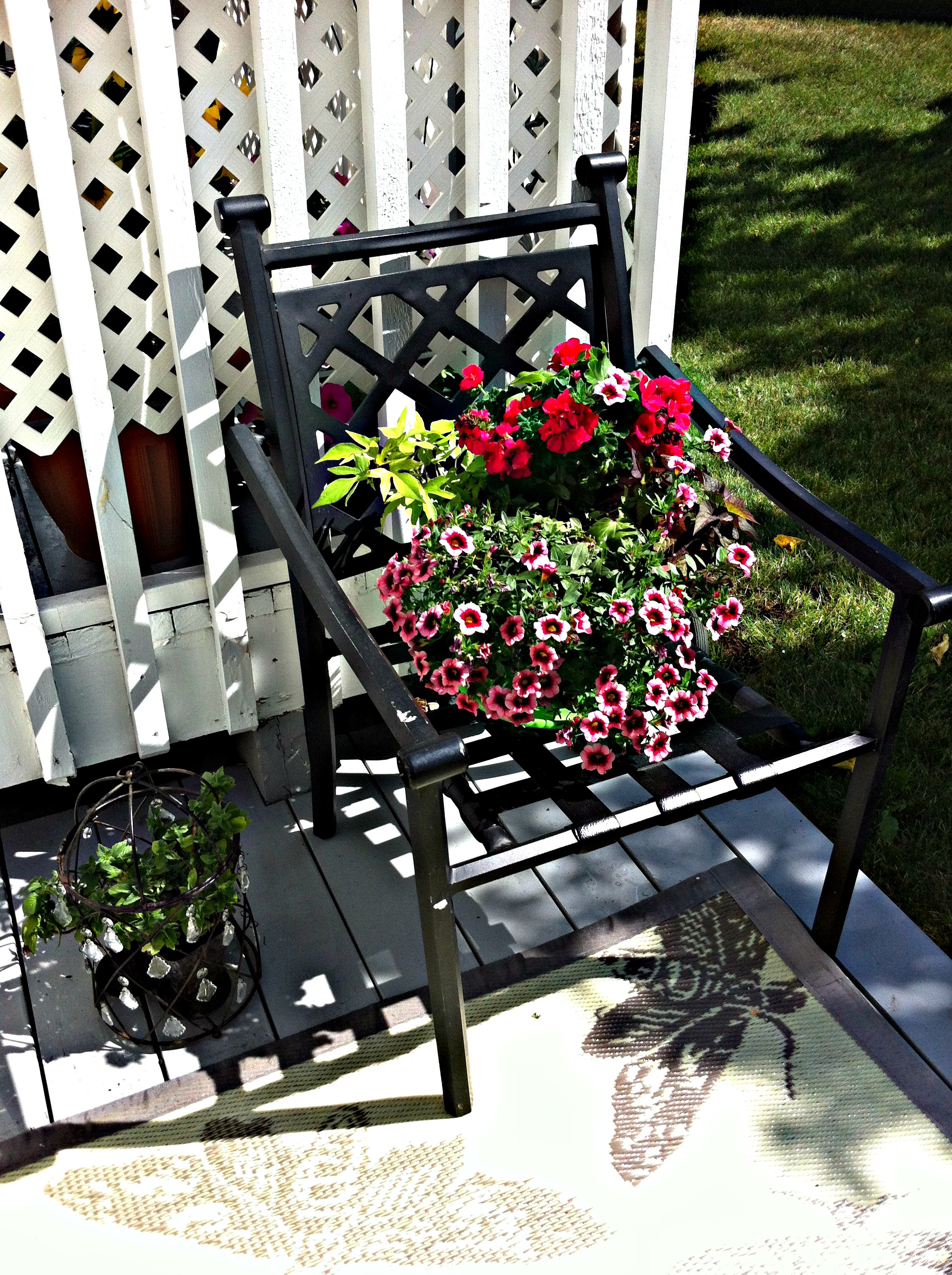 Repurposed Chair Planter 8 DIY Patio Accents #trashtotreasure #patio #diy #yard #garden #up-cycle #re-purpose #patio_table #plant_stand #bird_bath #herb_garden