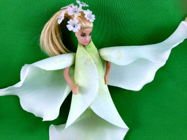 DIY Lily Fairy Flower Pot Insert Made With Abandoned Doll and Faux Lily Petals. #Fairies #Doll #Lily #Craft #Flower Fairy