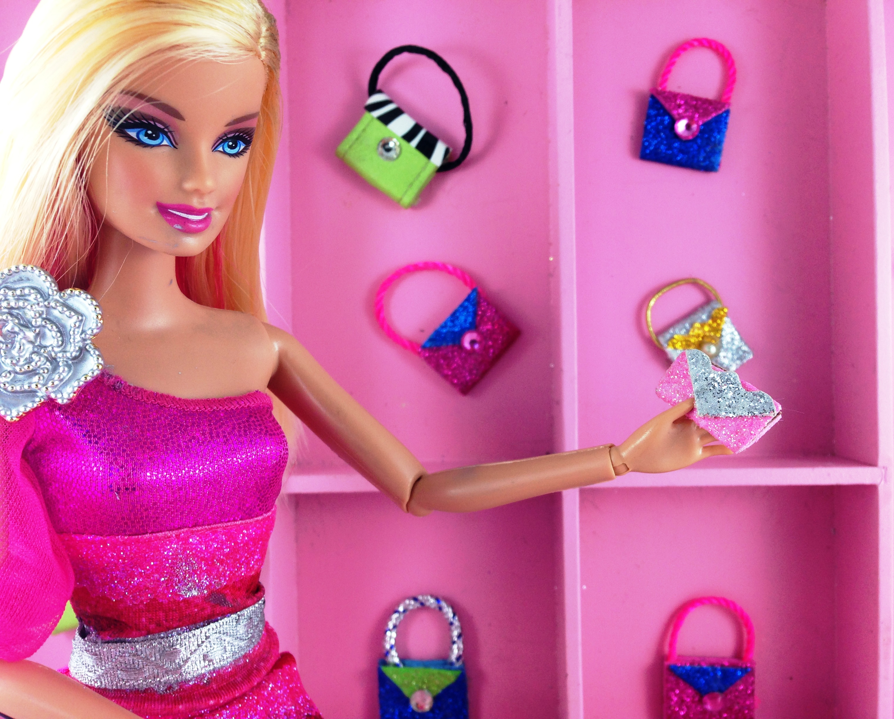 Easy DIY sparkly Barbie Doll purses made with sticky back sparkling foam from dollar store DIY Barbie Doll Easy NoSew Hand Made Purses #barbiedoll #accessories #purses #handmade #sparkle #Starrcreative