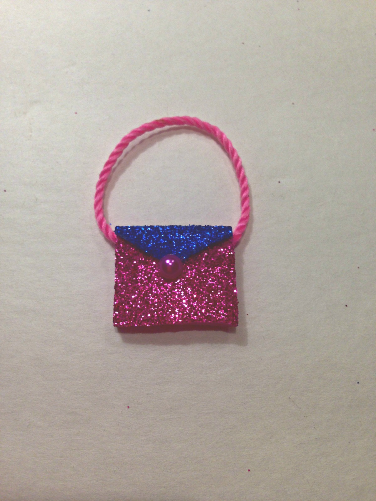 Easy DIY sparkly Barbie Doll purses made with sticky back sparkling foam from dollar store DIY Barbie Doll Easy NoSew Hand Made Purses #barbiedoll #accessories #purses #handmade #sparkle #Starrcreative